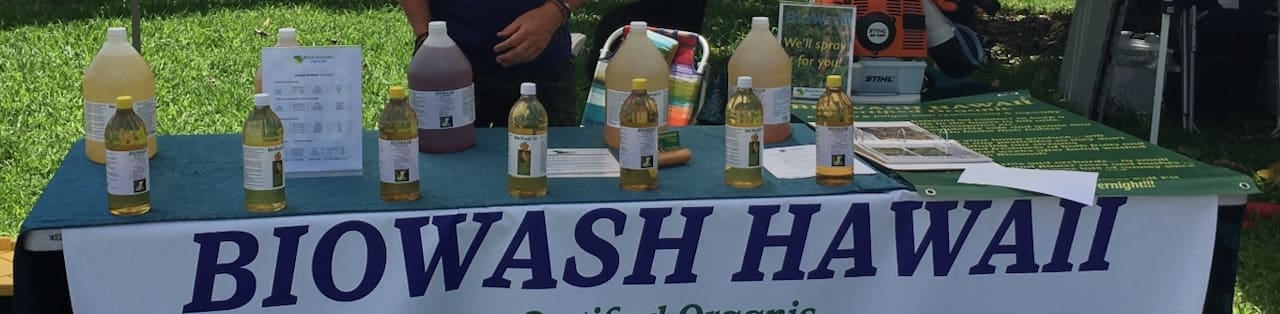 A table with several bottles of liquid on it.