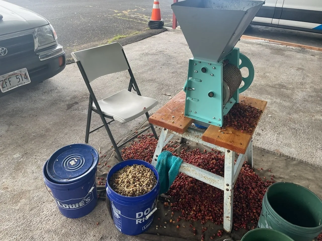 A table with two chairs and some buckets